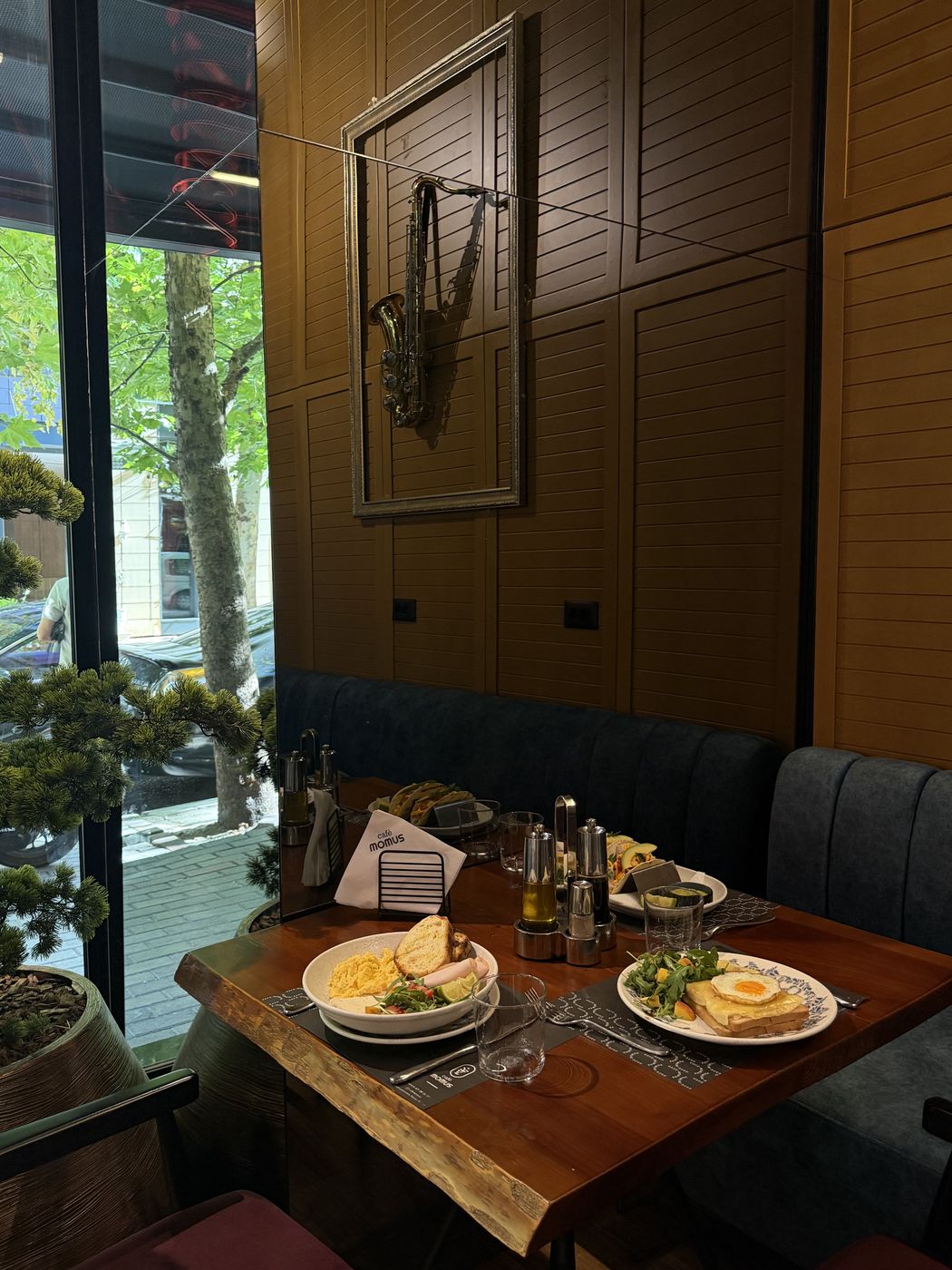 Table by the window at Café Momus